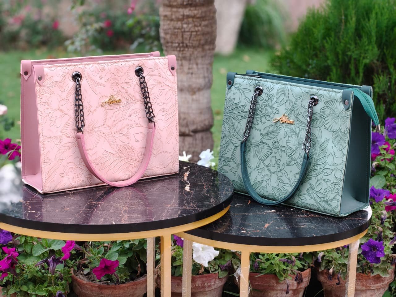 Auressa floral embossed handbags in pastel colors